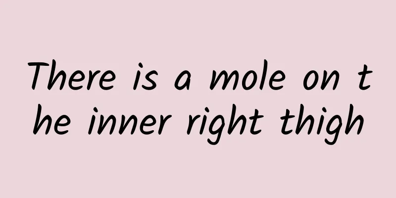 There is a mole on the inner right thigh