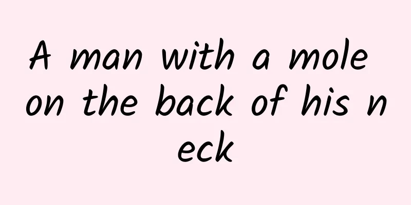 A man with a mole on the back of his neck