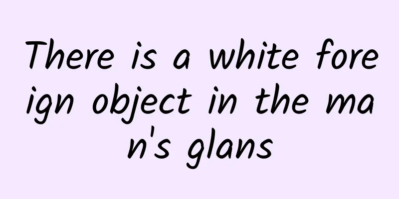 There is a white foreign object in the man's glans