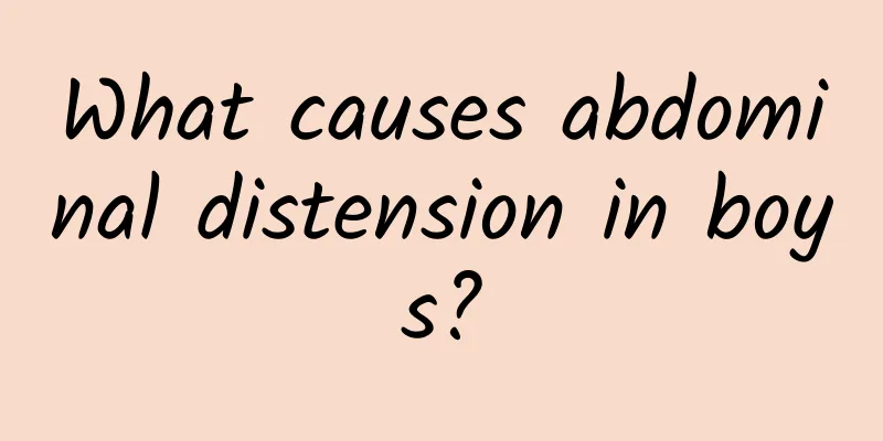 What causes abdominal distension in boys?