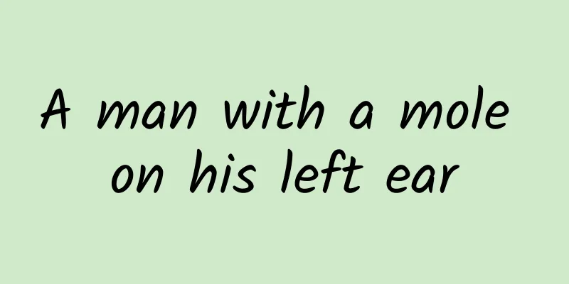 A man with a mole on his left ear