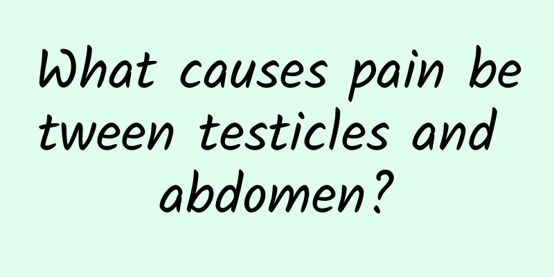 What causes pain between testicles and abdomen?