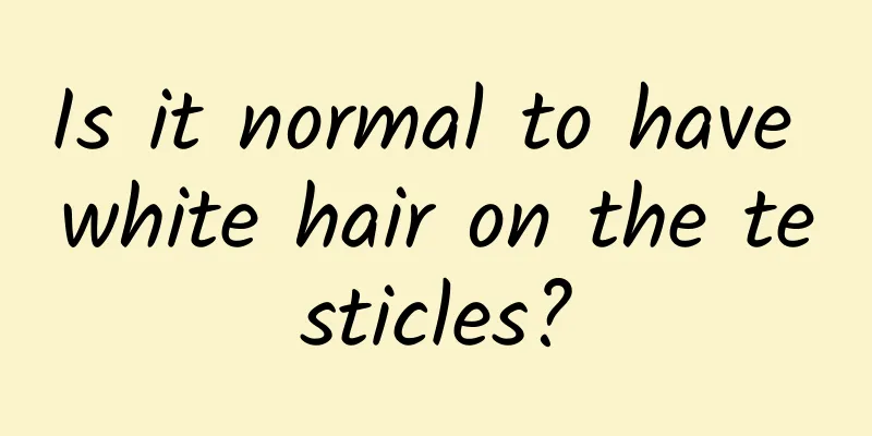 Is it normal to have white hair on the testicles?
