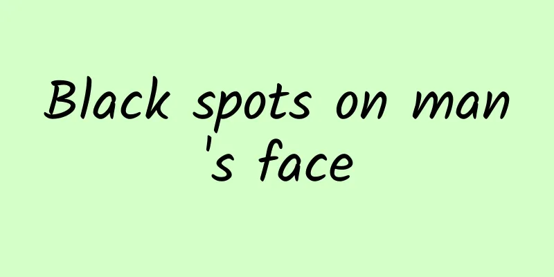 Black spots on man's face