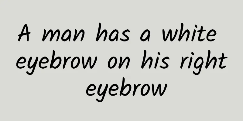 A man has a white eyebrow on his right eyebrow
