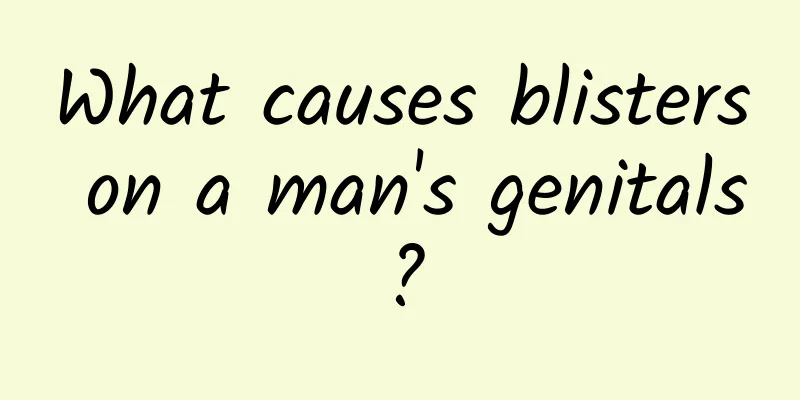 What causes blisters on a man's genitals?