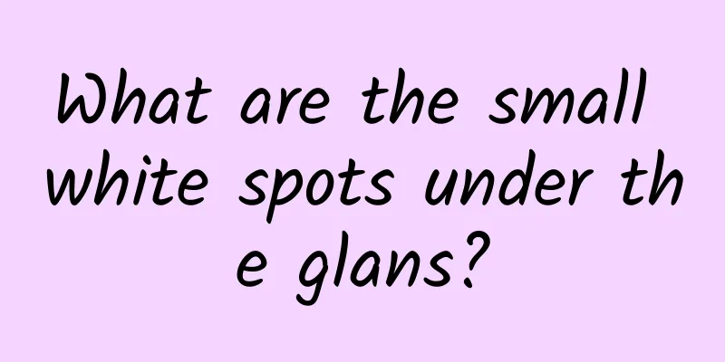 What are the small white spots under the glans?