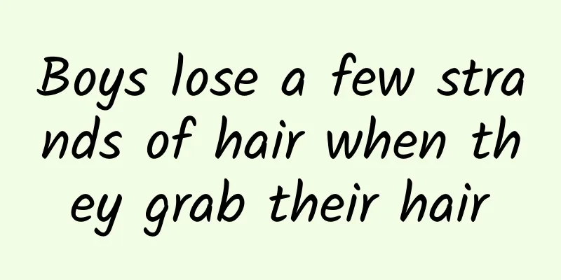 Boys lose a few strands of hair when they grab their hair