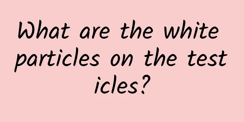 What are the white particles on the testicles?