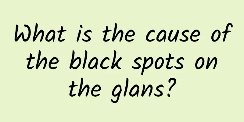 What is the cause of the black spots on the glans?