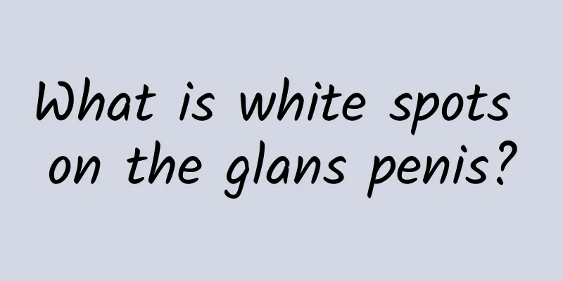 What is white spots on the glans penis?