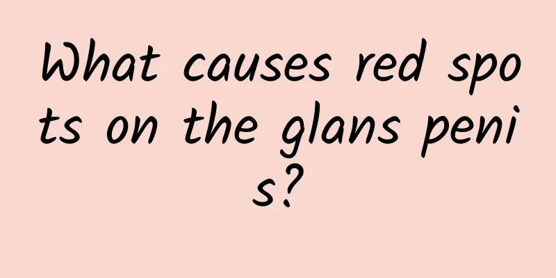 What causes red spots on the glans penis?