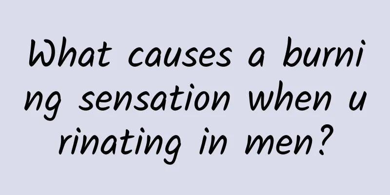 What causes a burning sensation when urinating in men?