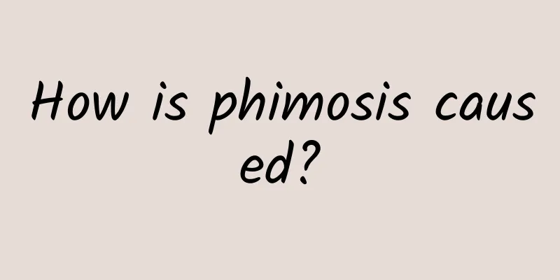 How is phimosis caused?