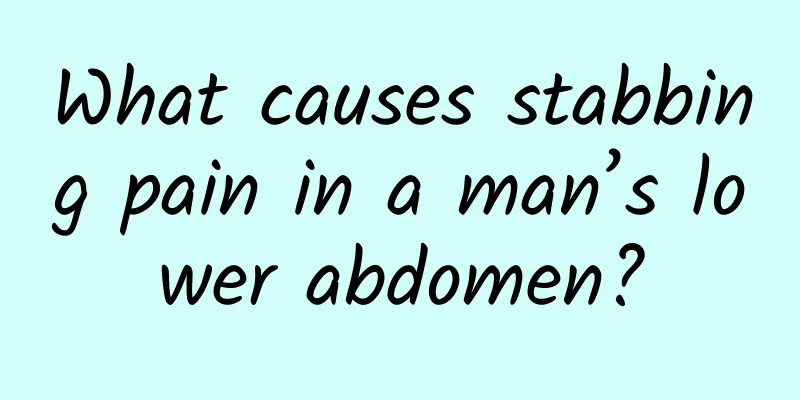 What causes stabbing pain in a man’s lower abdomen?