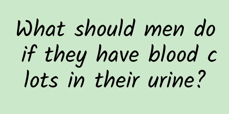 What should men do if they have blood clots in their urine?