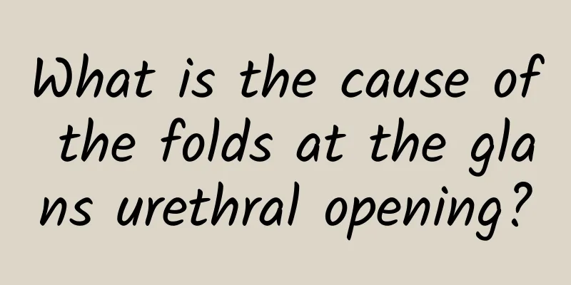 What is the cause of the folds at the glans urethral opening?