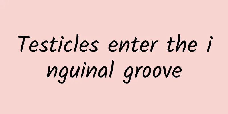 Testicles enter the inguinal groove