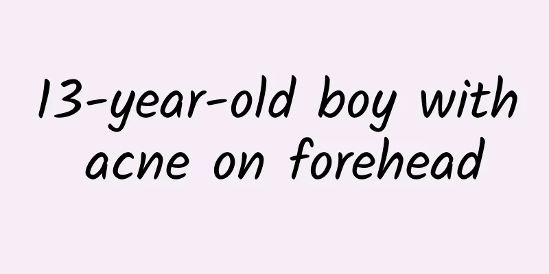 13-year-old boy with acne on forehead