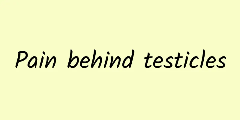 Pain behind testicles