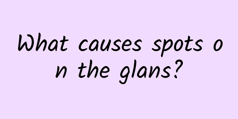 What causes spots on the glans?