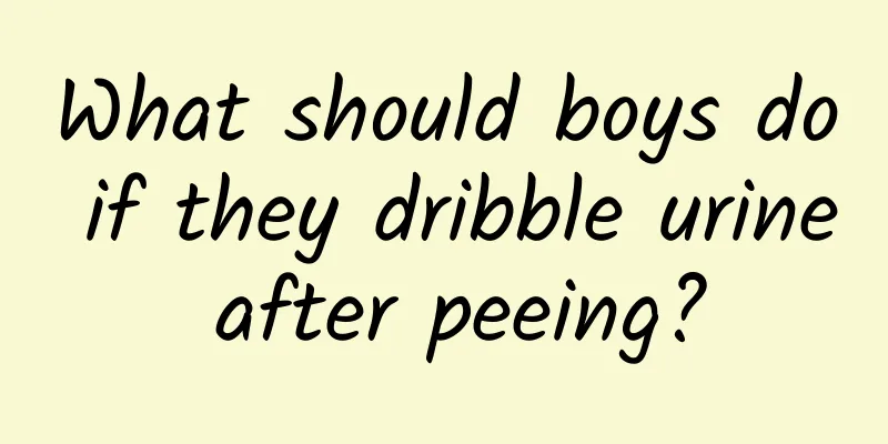 What should boys do if they dribble urine after peeing?