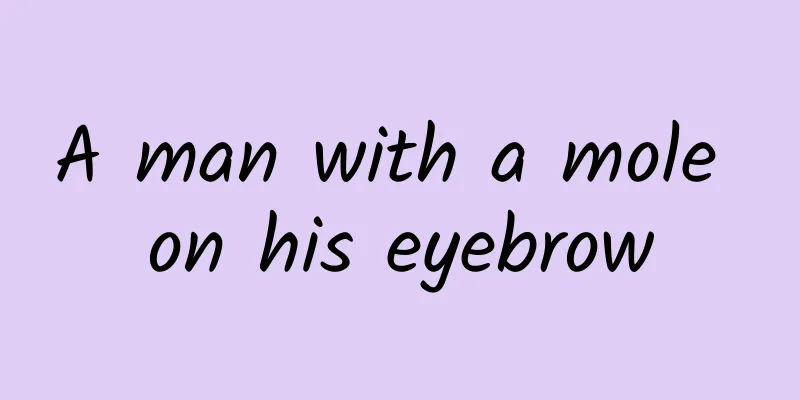 A man with a mole on his eyebrow