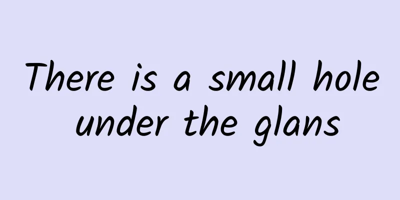 There is a small hole under the glans