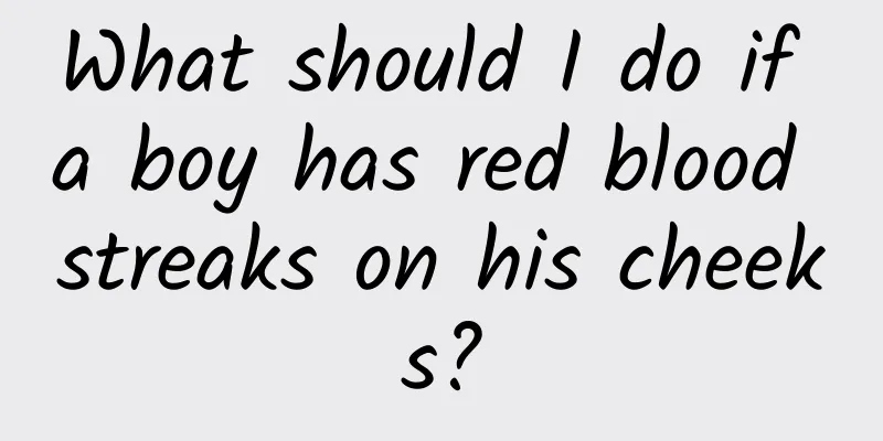What should I do if a boy has red blood streaks on his cheeks?