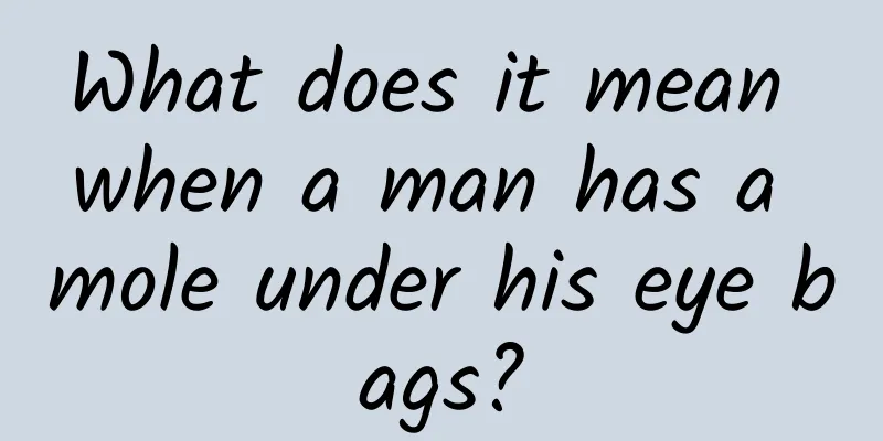 What does it mean when a man has a mole under his eye bags?