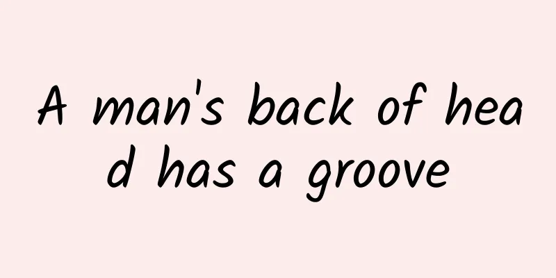 A man's back of head has a groove