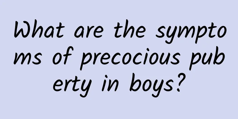 What are the symptoms of precocious puberty in boys?