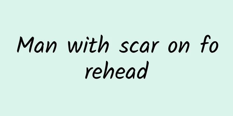 Man with scar on forehead