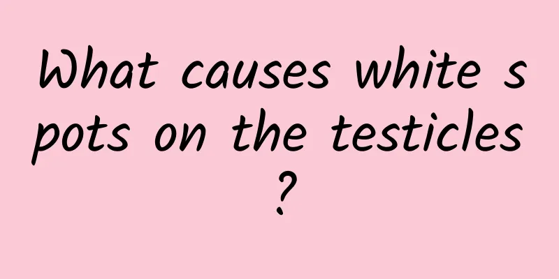 What causes white spots on the testicles?