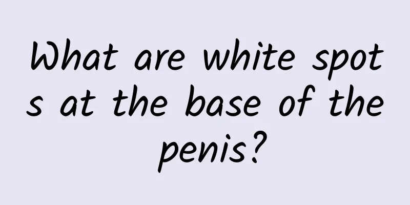 What are white spots at the base of the penis?