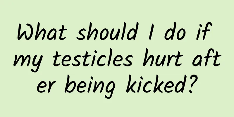What should I do if my testicles hurt after being kicked?