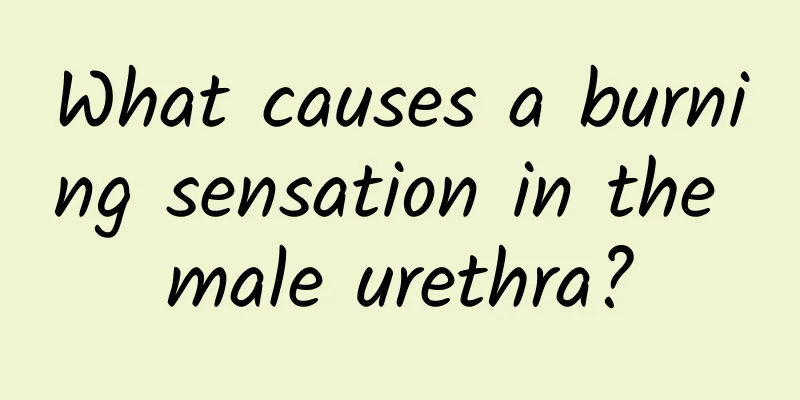 What causes a burning sensation in the male urethra?