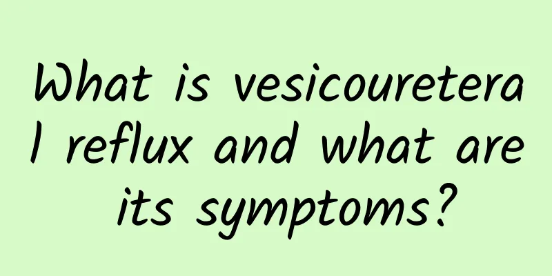What is vesicoureteral reflux and what are its symptoms?