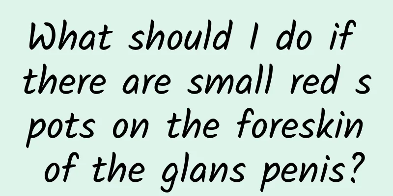 What should I do if there are small red spots on the foreskin of the glans penis?