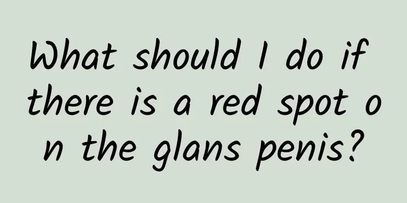 What should I do if there is a red spot on the glans penis?