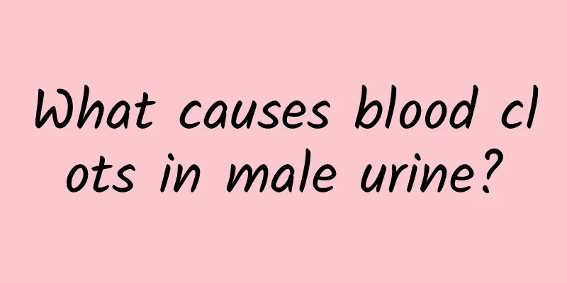 What causes blood clots in male urine?
