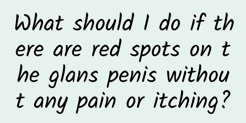 What should I do if there are red spots on the glans penis without any pain or itching?