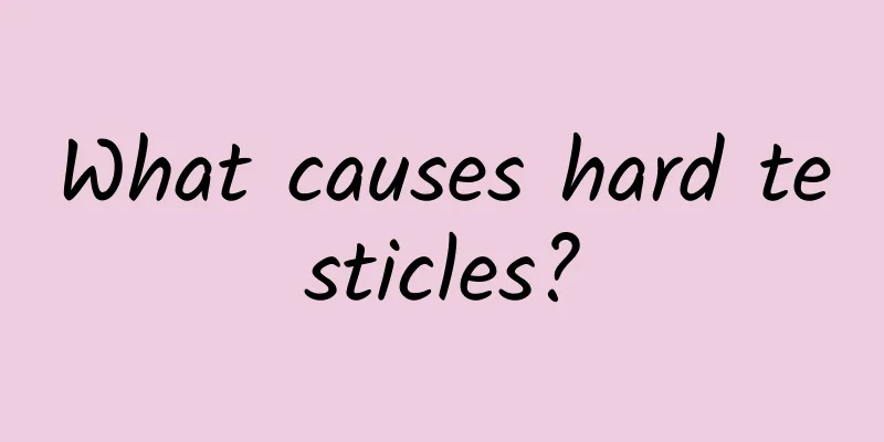 What causes hard testicles?