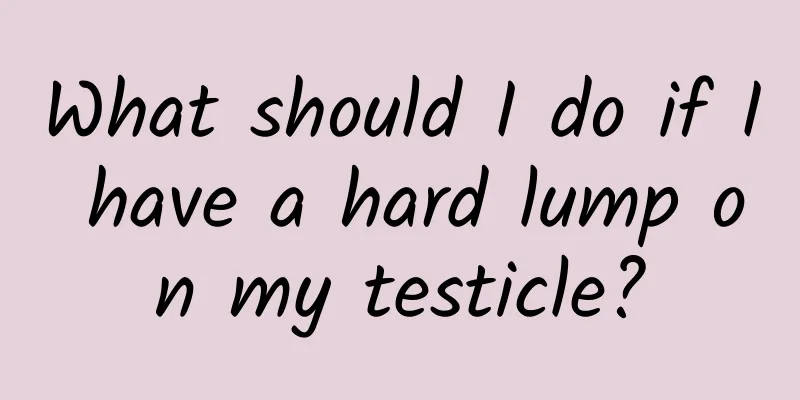 What should I do if I have a hard lump on my testicle?