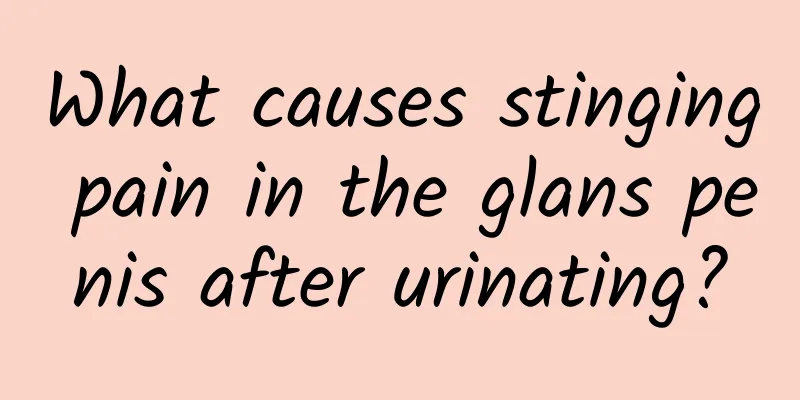 What causes stinging pain in the glans penis after urinating?