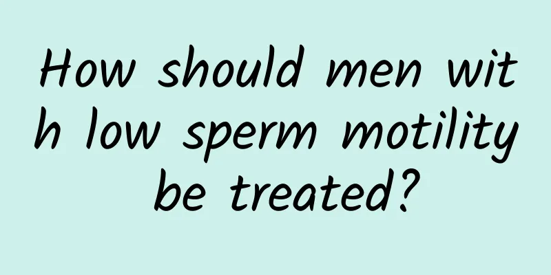 How should men with low sperm motility be treated?