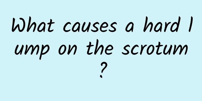 What causes a hard lump on the scrotum?