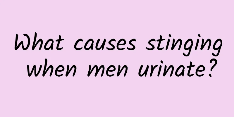 What causes stinging when men urinate?