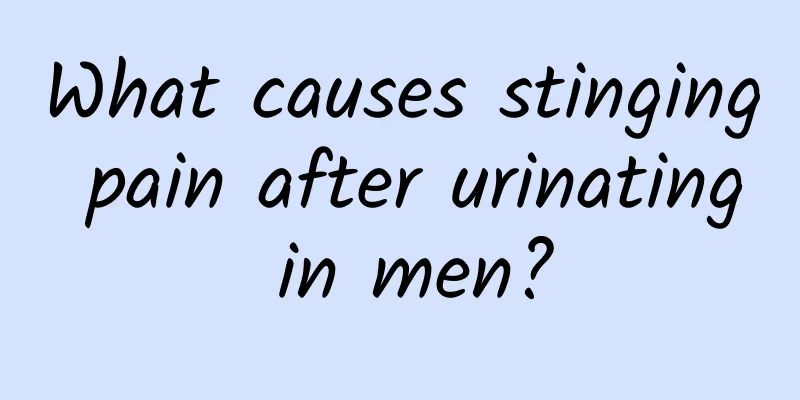 What causes stinging pain after urinating in men?