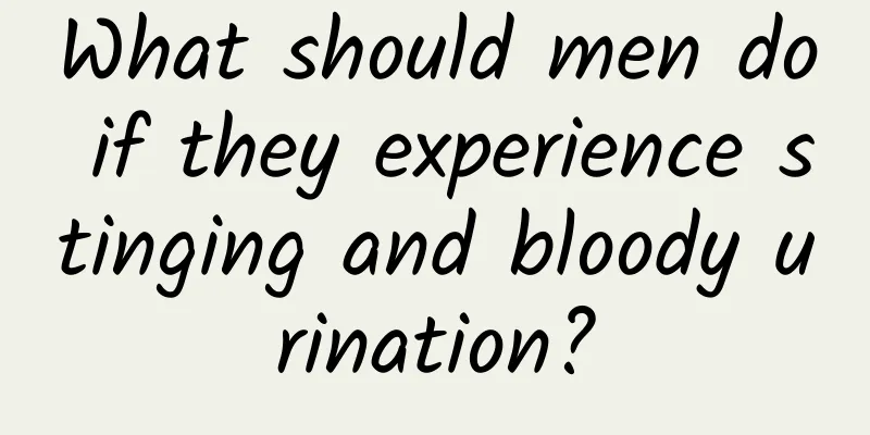 What should men do if they experience stinging and bloody urination?
